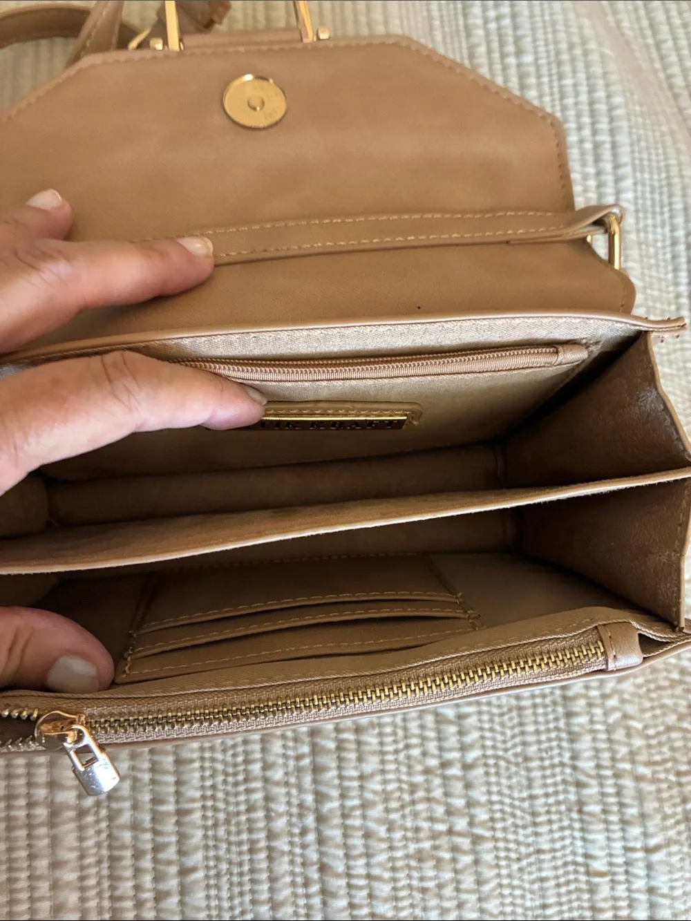Stylish Tan Crossbody Bag with Gold Accent Hardware